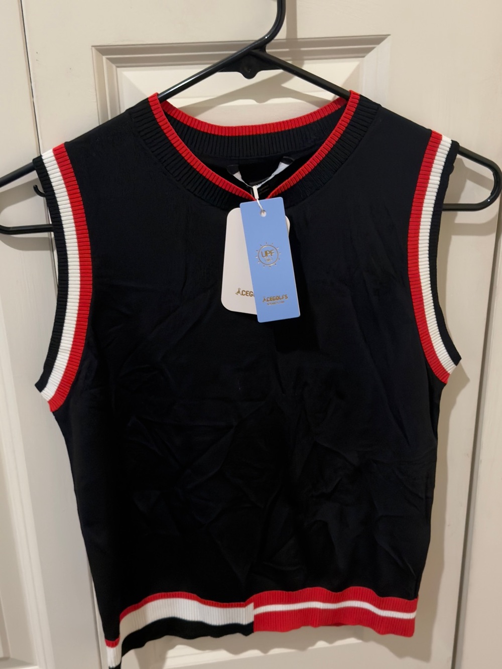 Black Sleeveless Knit Top with Red & White Trim